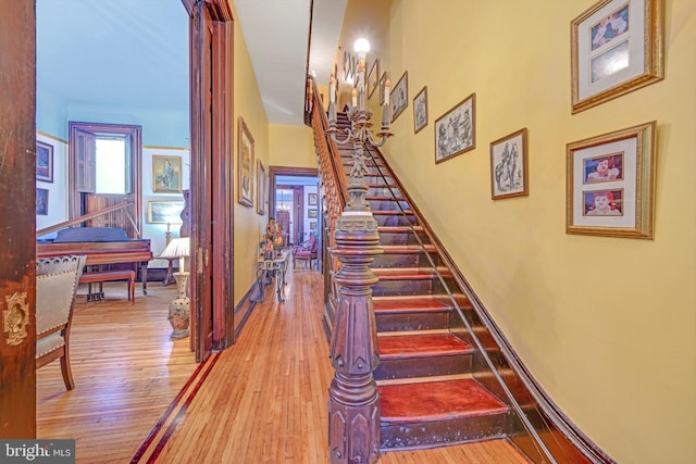 226 S 5th St, Reading, PA 19602 - stairs featuring wood-type flooring and baseboards