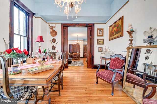 226 S 5th St, Reading, PA 19602 - dining area with a chandelier and light wood-type flooring