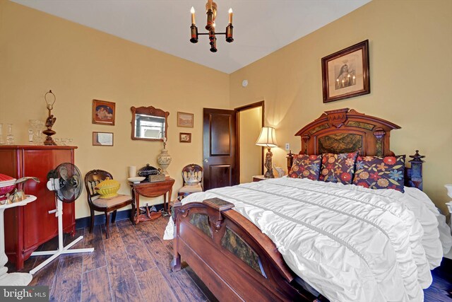 226 S 5th St, Reading, PA 19602 - bedroom featuring wood finished floors and a chandelier