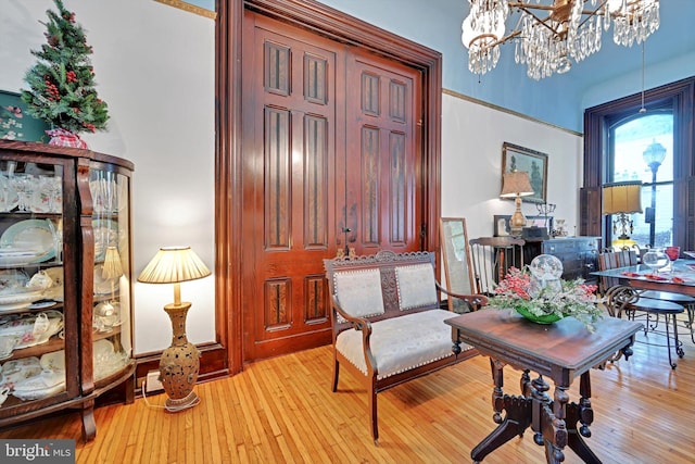 226 S 5th St, Reading, PA 19602 - sitting room with wood-type flooring and a chandelier