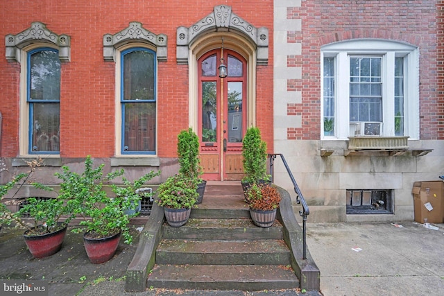 226 S 5th St, Reading, PA 19602 - view of exterior entry featuring french doors, brick siding, and stone siding