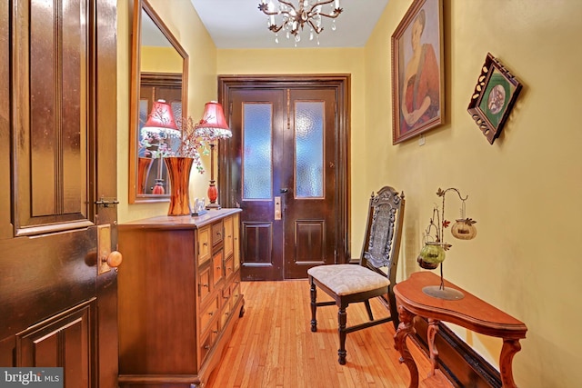 226 S 5th St, Reading, PA 19602 - foyer entrance featuring a chandelier and light wood-type flooring
