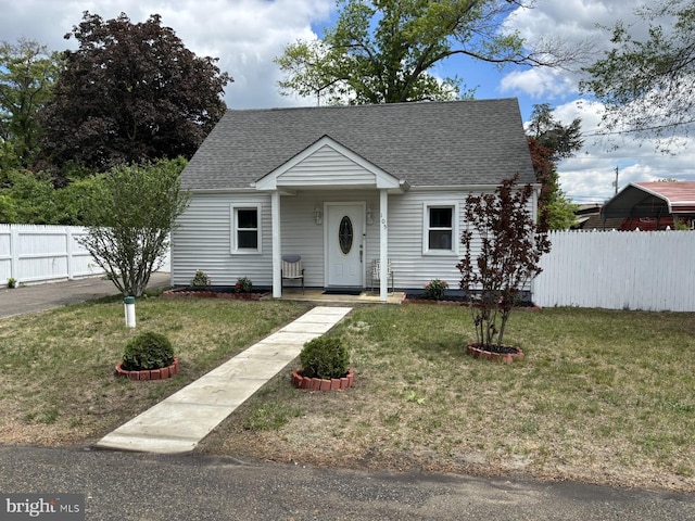view of front of house featuring roof with shingles