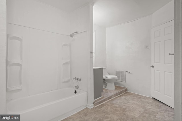 bathroom featuring toilet and bathtub / shower combination