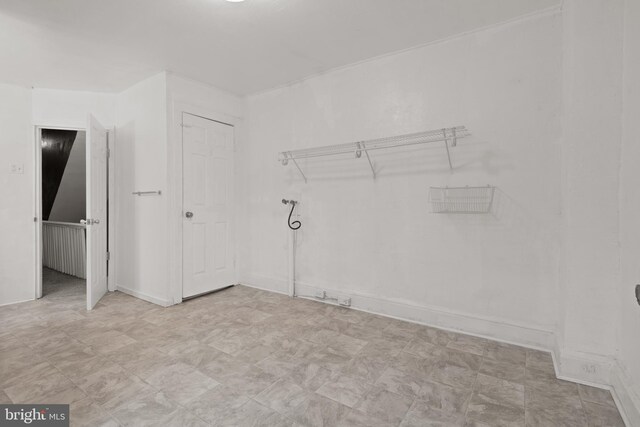 laundry room featuring light floors