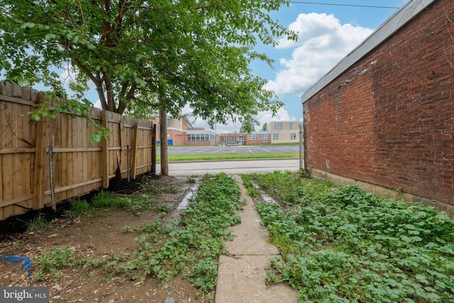 view of yard featuring fence