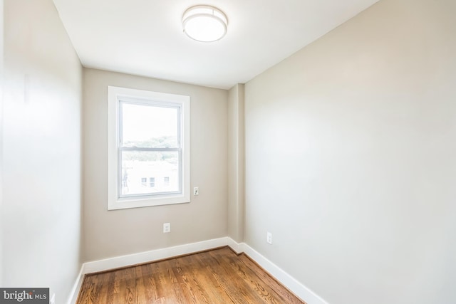 1778 Lang Pl NE, Washington, DC 20002 - empty room with baseboards and wood finished floors