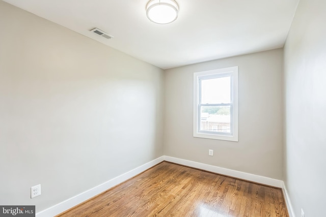 1778 Lang Pl NE, Washington, DC 20002 - unfurnished room featuring baseboards and wood finished floors