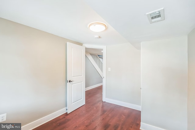 1778 Lang Pl NE, Washington, DC 20002 - empty room featuring dark wood finished floors, baseboards, and a smoke detector