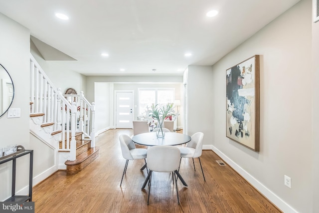 1778 Lang Pl NE, Washington, DC 20002 - dining room with stairway, wood finished floors, baseboards, and recessed lighting