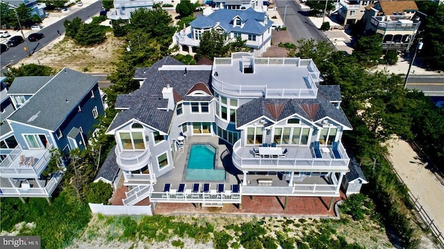 6601 Ocean Blvd, Long Beach Township, NJ 08008 - aerial perspective of suburban area featuring a pool area