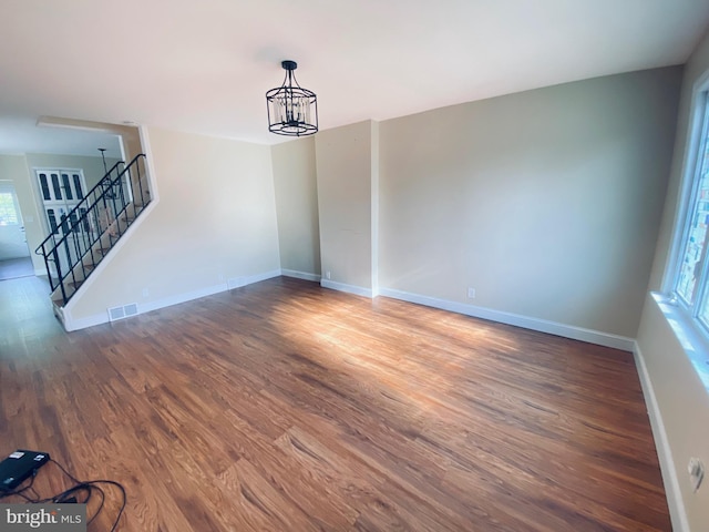976 Klockner Rd, Hamilton Township, NJ 08619 - empty room featuring wood finished floors, plenty of natural light, baseboards, and stairs