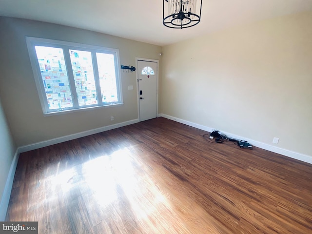 976 Klockner Rd, Hamilton Township, NJ 08619 - entryway featuring dark wood-style flooring, a chandelier, and baseboards