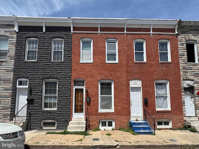1332 Sargeant St, Baltimore, MD 21223 - view of property with entry steps and brick siding