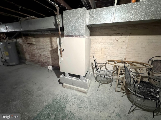 1332 Sargeant St, Baltimore, MD 21223 - utility room featuring water heater