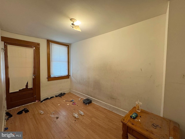 1332 Sargeant St, Baltimore, MD 21223 - unfurnished dining area featuring wood finished floors and baseboards