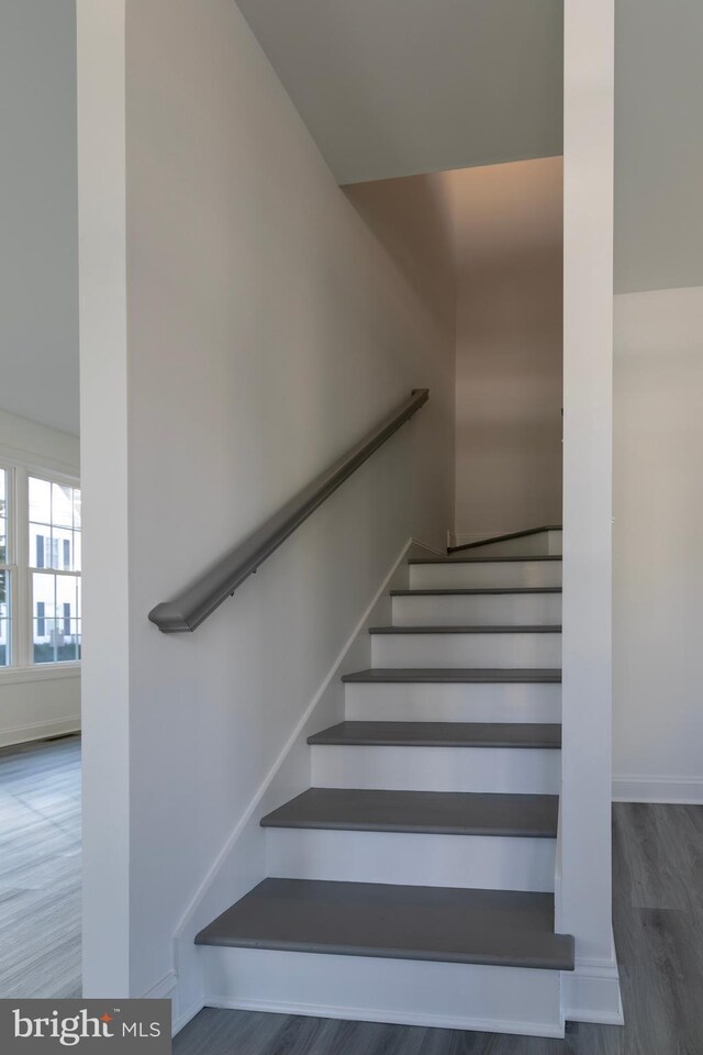 93 6th St W, Laurel, DE 19956 - staircase with wood finished floors and baseboards
