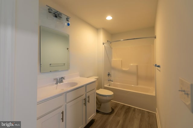 93 6th St W, Laurel, DE 19956 - full bathroom featuring toilet, wood finished floors, vanity, tub / shower combination, and recessed lighting
