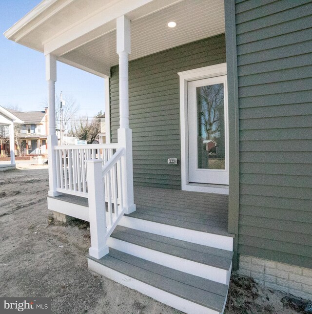93 6th St W, Laurel, DE 19956 - view of exterior entry featuring a porch