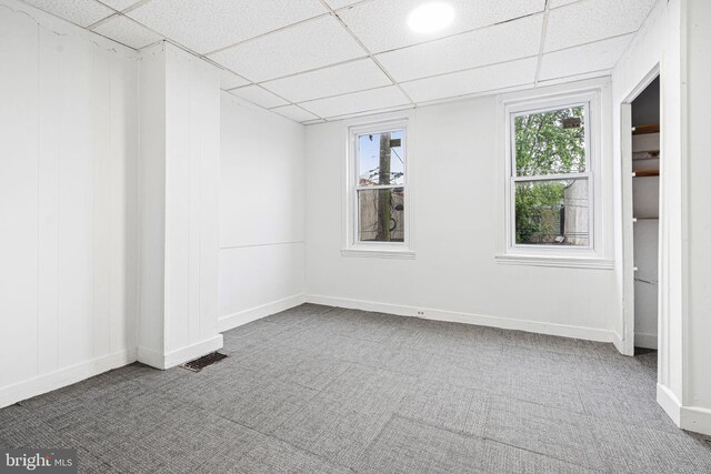 2943 Gransback St, Philadelphia, PA 19134 - carpeted empty room featuring a paneled ceiling and baseboards
