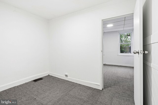2943 Gransback St, Philadelphia, PA 19134 - spare room featuring dark colored carpet and baseboards