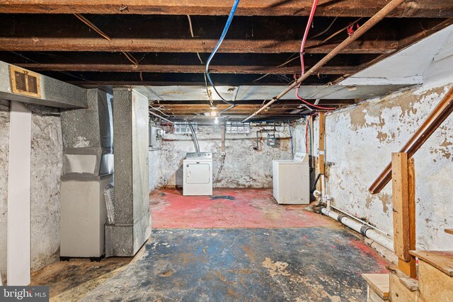 2943 Gransback St, Philadelphia, PA 19134 - unfinished below grade area with independent washer and dryer, gas meter, and heating unit