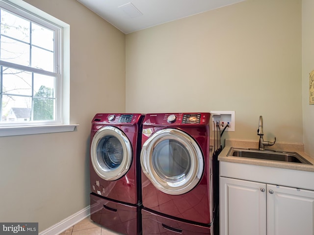 606 Borough Line Rd, Collegeville, PA 19426 - laundry area featuring cabinet space, independent washer and dryer, light tile patterned flooring, and baseboards