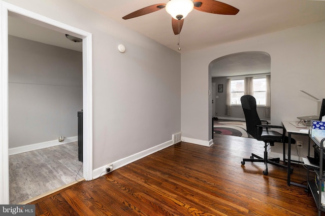 4504 Vista St, Philadelphia, PA 19136 - office featuring arched walkways, a ceiling fan, wood finished floors, and baseboards