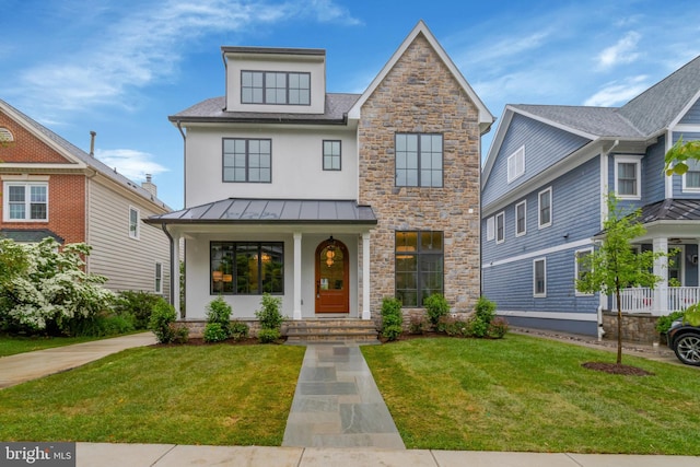 1416 N Hancock St, Arlington, VA 22201 - view of front of home with stone siding, a front lawn, a standing seam roof, and stucco siding