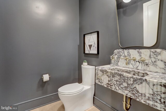 1416 N Hancock St, Arlington, VA 22201 - half bathroom with toilet and wood finished floors