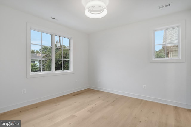 1416 N Hancock St, Arlington, VA 22201 - spare room featuring baseboards and light wood-style flooring