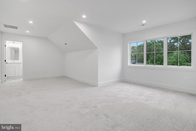 1416 N Hancock St, Arlington, VA 22201 - additional living space with baseboards, recessed lighting, light colored carpet, and vaulted ceiling