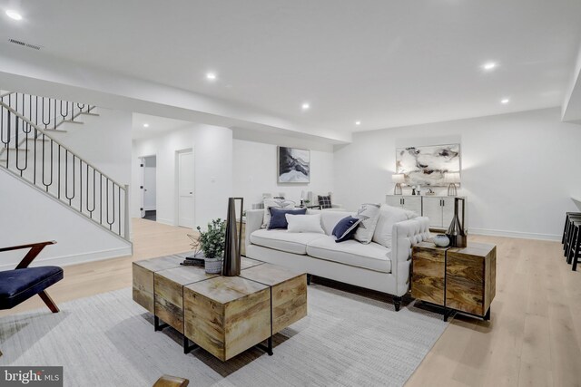 1416 N Hancock St, Arlington, VA 22201 - living area featuring light wood-type flooring, recessed lighting, and stairs