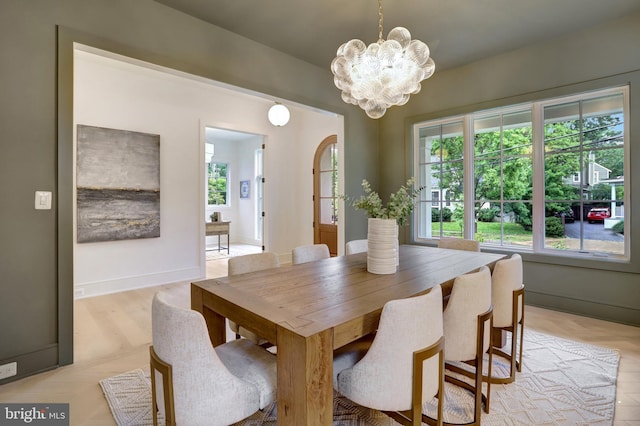 1416 N Hancock St, Arlington, VA 22201 - dining room featuring a chandelier, plenty of natural light, and baseboards