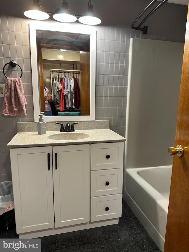 18421 Lower Georges Creek Rd SW, Barton, MD 21521 - full bathroom featuring tile walls, vanity, and  shower combination