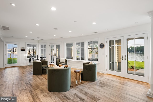 17 Revell St, Annapolis, MD 21401 - living area with french doors, light wood-style floors, plenty of natural light, and recessed lighting