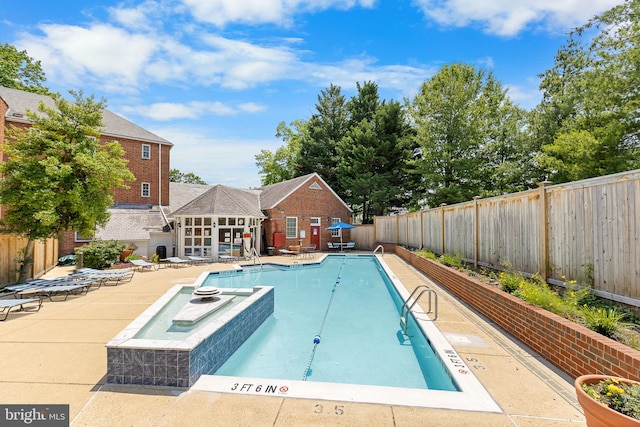 1716 W Abingdon Dr Unit 103, Alexandria, VA 22314 - community pool featuring a patio, a fenced backyard, and a hot tub