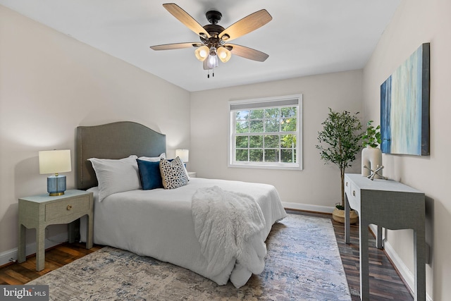 1716 W Abingdon Dr Unit 103, Alexandria, VA 22314 - bedroom featuring wood finished floors, baseboards, and ceiling fan