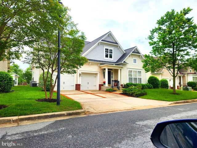view of front of property featuring a front yard, driveway, central air condition unit, and brick siding