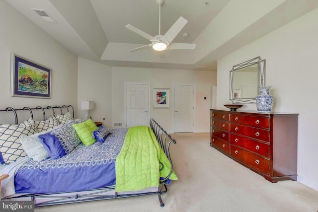 13605 Autumn End Ter, Laurel, MD 20707 - carpeted bedroom with a raised ceiling and a ceiling fan