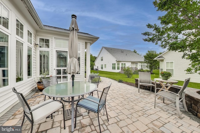 13605 Autumn End Ter, Laurel, MD 20707 - view of patio featuring outdoor dining space and a residential view