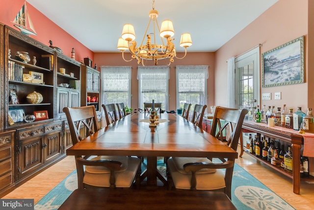 15149 Coultlands Reach, Milton, DE 19968 - dining room featuring a chandelier and light wood-style floors