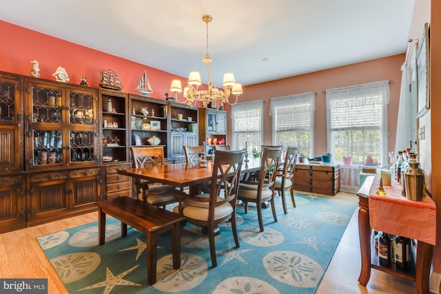 15149 Coultlands Reach, Milton, DE 19968 - dining area featuring a chandelier and wood finished floors