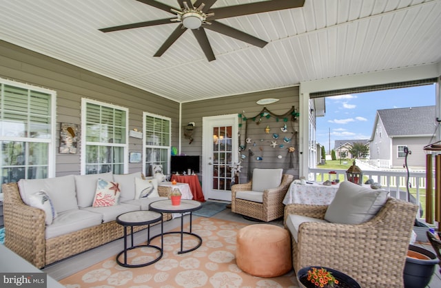 15149 Coultlands Reach, Milton, DE 19968 - sunroom featuring a ceiling fan and an outdoor hangout area