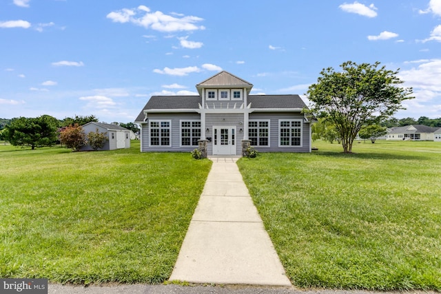 15149 Coultlands Reach, Milton, DE 19968 - view of front of property with a front lawn, french doors, and an outbuilding