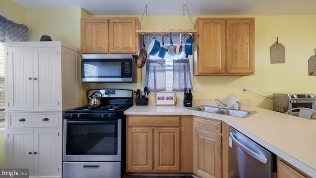 439 Hillcrest Ave, Glenolden, PA 19036 - kitchen with stainless steel appliances and light countertops