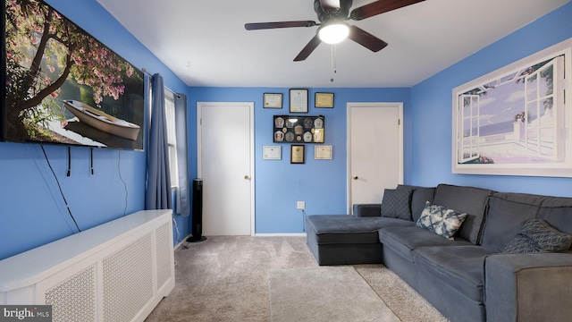 439 Hillcrest Ave, Glenolden, PA 19036 - living area with carpet, ceiling fan, and radiator heating unit