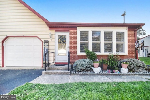 17 Drake St Unit 54A, Whiting, NJ 08759 - view of front of house with a garage, brick siding, and driveway