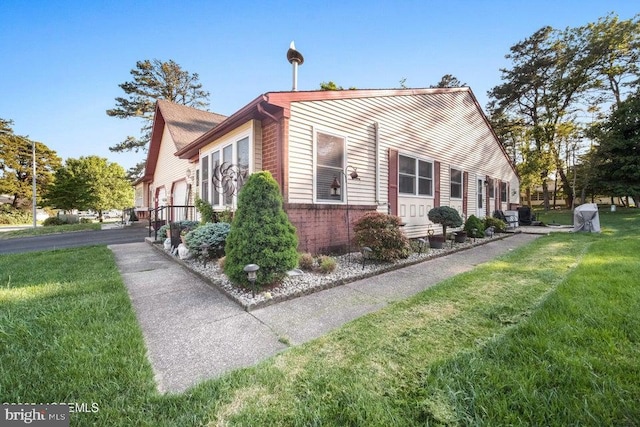17 Drake St Unit 54A, Whiting, NJ 08759 - view of side of property featuring brick siding and a yard