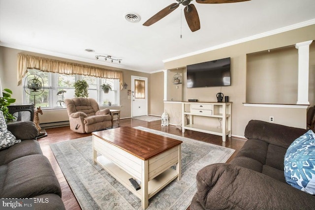 17 Drake St Unit 54A, Whiting, NJ 08759 - living room featuring wood finished floors, baseboard heating, ceiling fan, crown molding, and baseboards